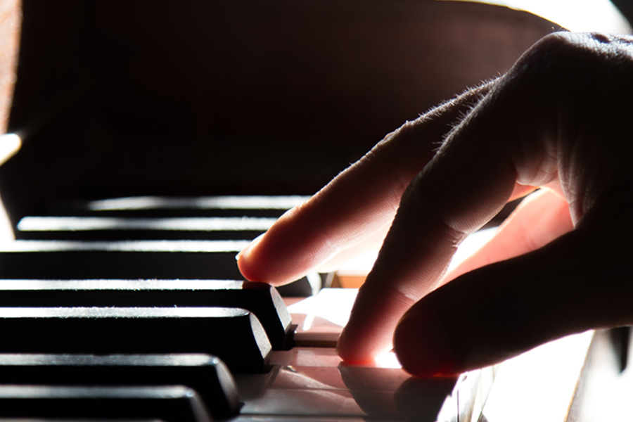 person playing a piano