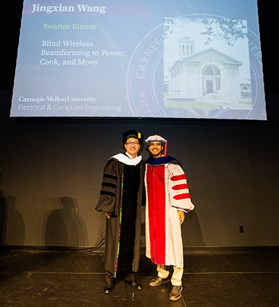 Wang and Kumar at graduation