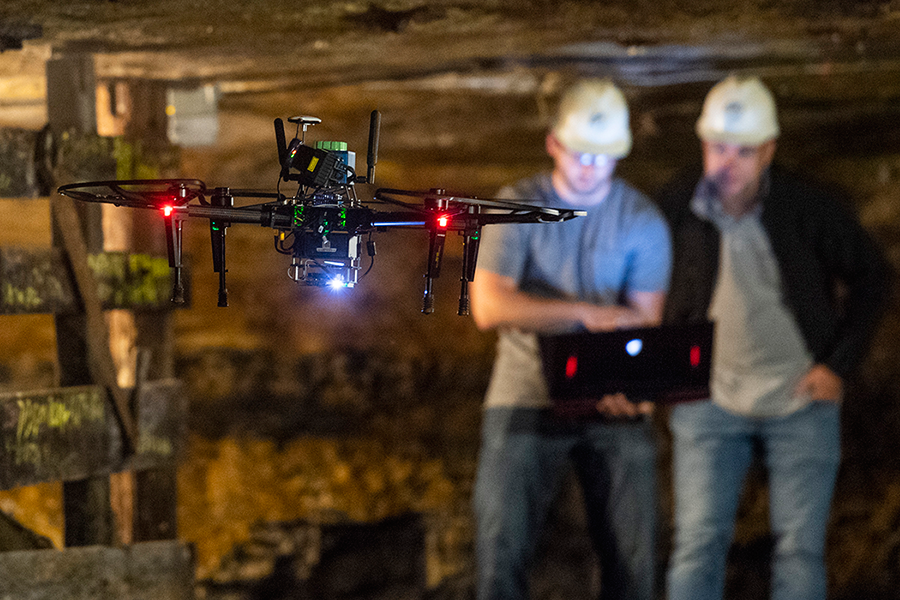 students controlling a drone