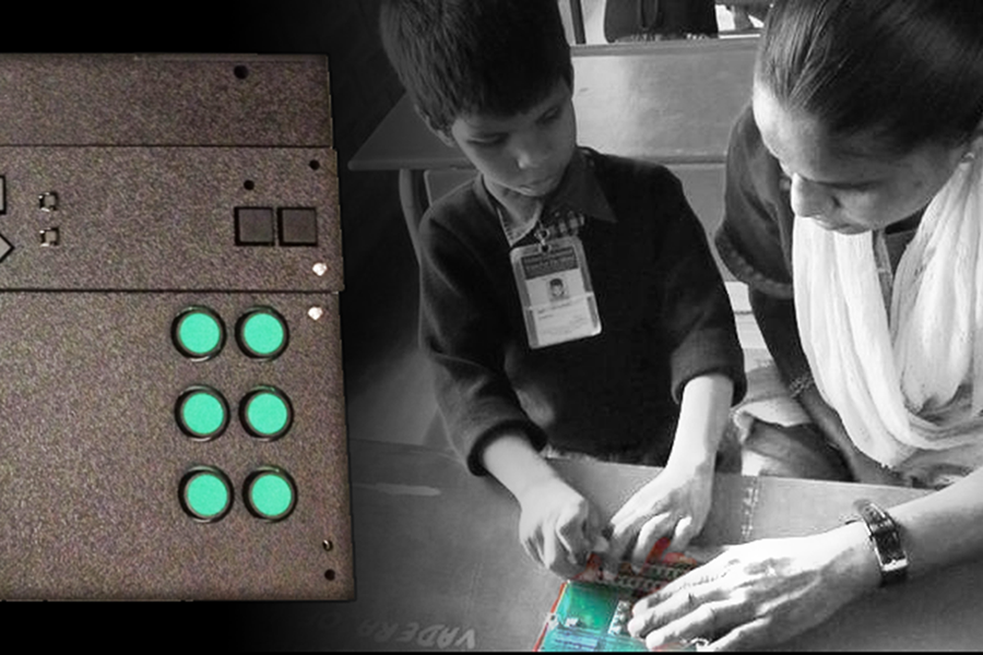 woman teaching braille