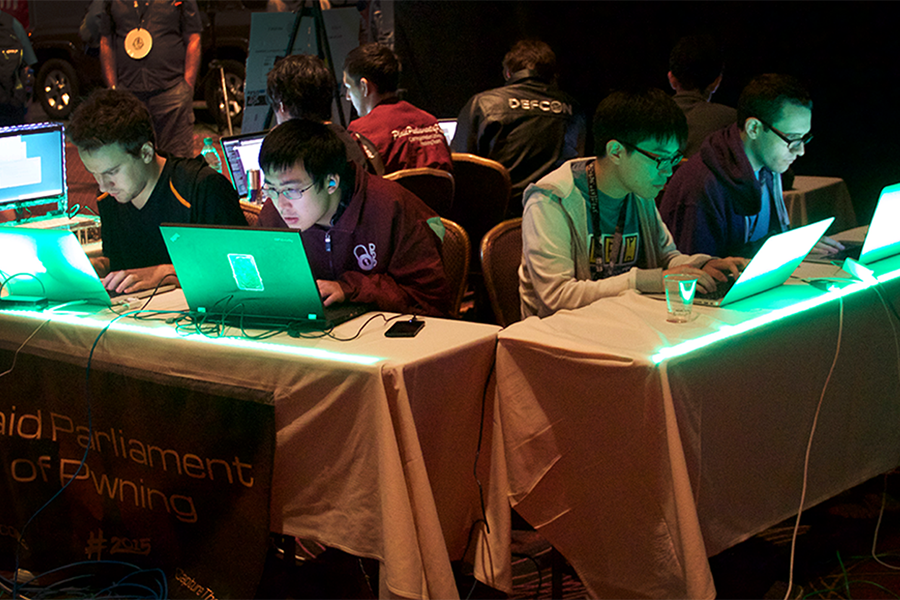 students hacking at DefCon