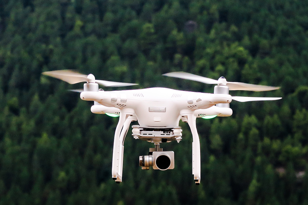 Drone flying over forest
