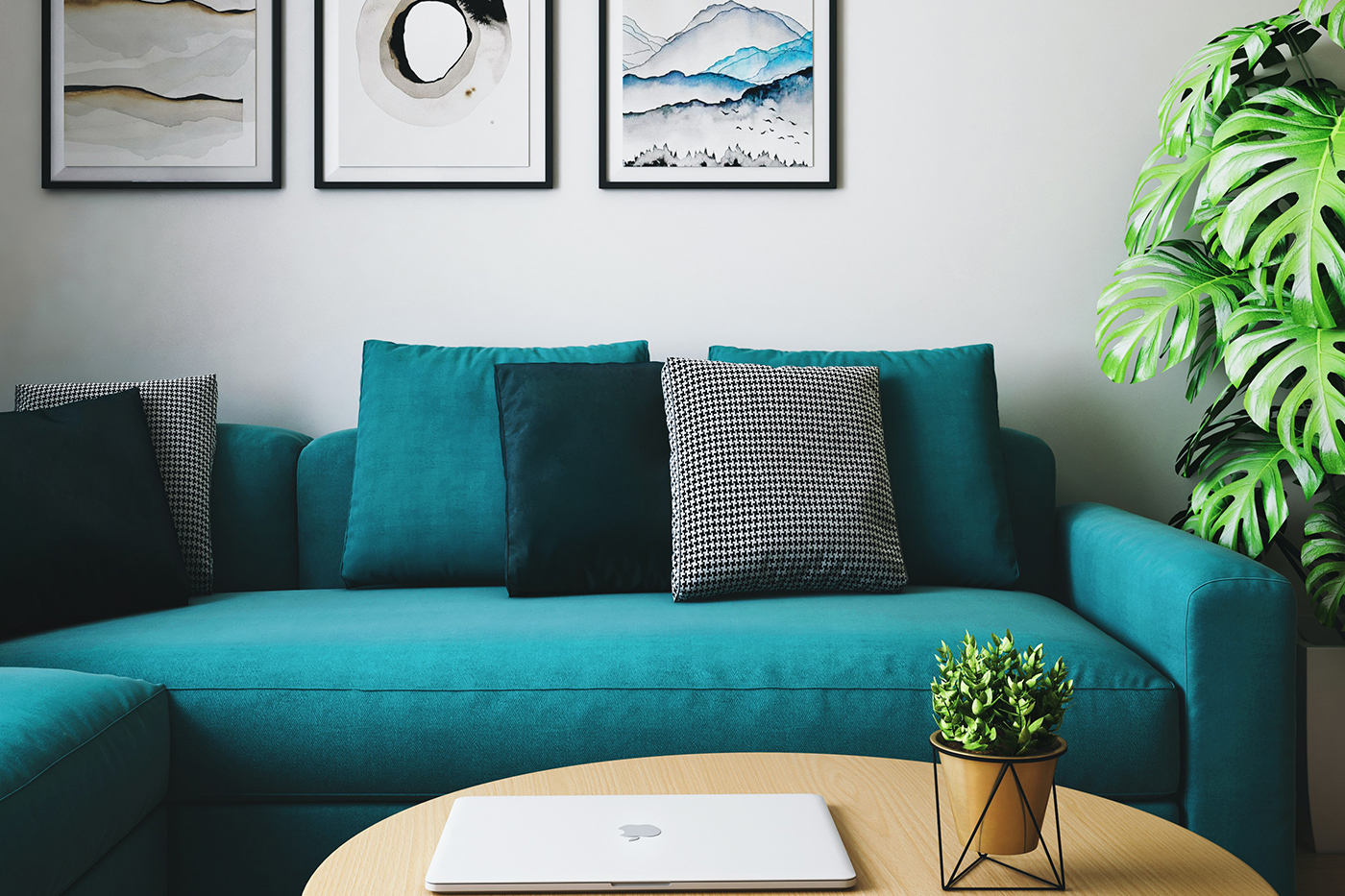 blue couch with a computer 