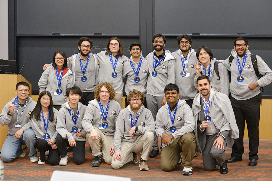 The winning team of students after receiving their medals.
